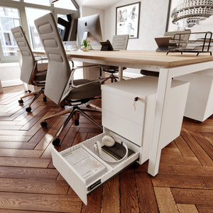 Wit rolblok met 3 laden in kantooromgeving