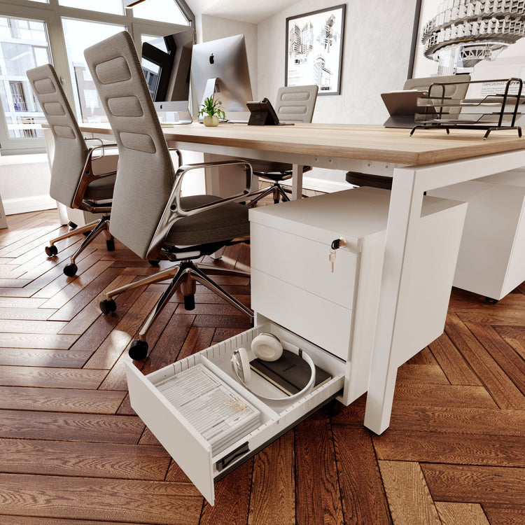 Wit rolblok met 3 laden in kantooromgeving